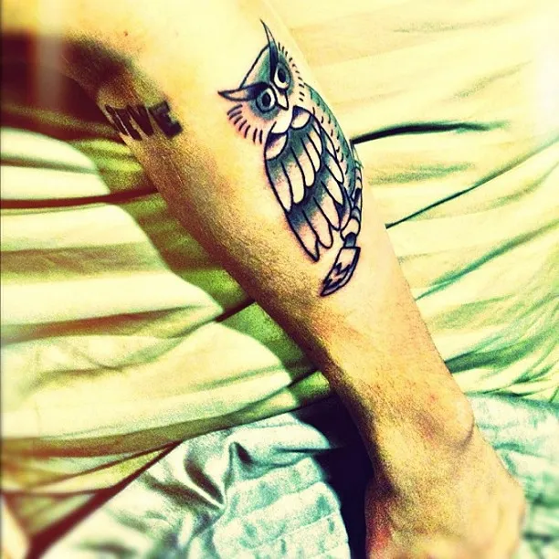 Justin Bieber’s Tattoos owl tatoo